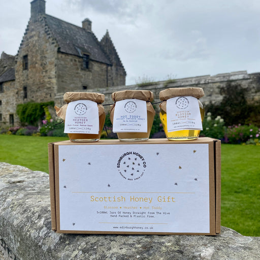 scottish honey gift set of 3 honey jars with presentation box in front of abderdour castle 