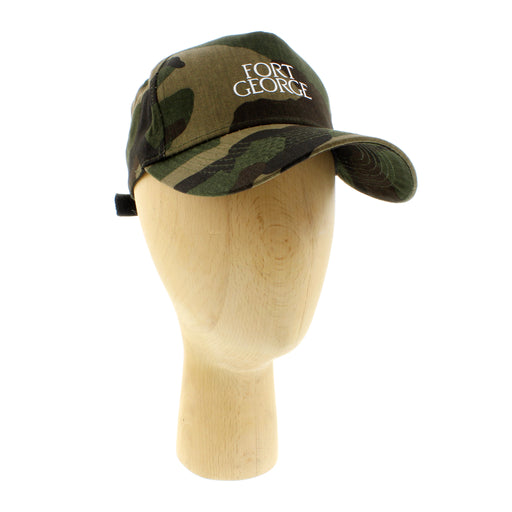 Wooden mannequin head shows a camo-print  cap with white Embroidered writing which reads Fort George