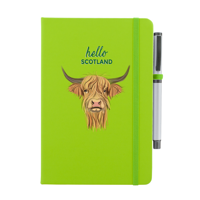 Lime Green soft feel note pad with a highland cow motif. the text above reads 'hello SCOTLAND' and comes with a silver pen attached.