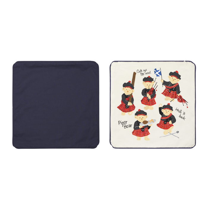 Natural coloured cushion cover with navy backing features dancing Piper Bears.