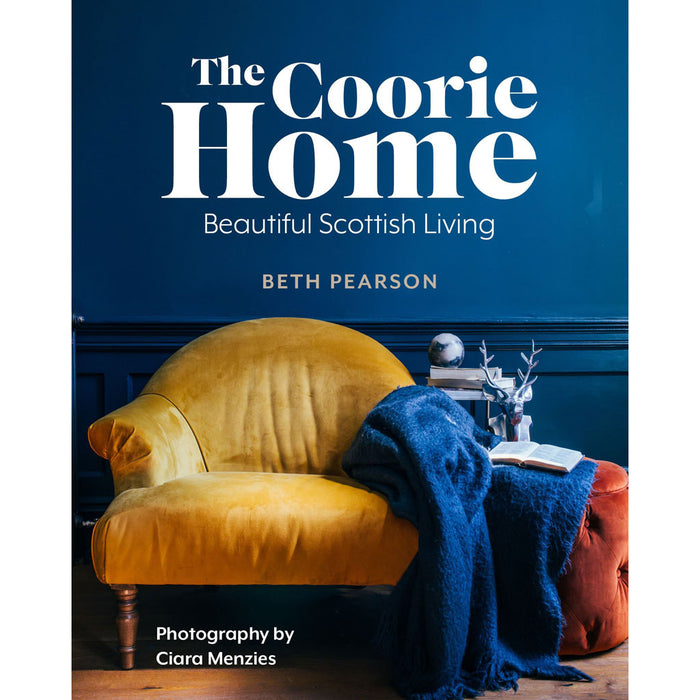 Front cover the The Coorie Home book publication features a blue wall and mustard armchair. 