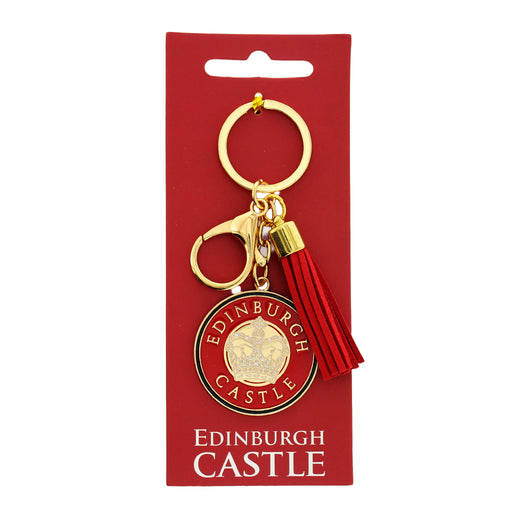 Edinburgh Castle bag charm with red tassel on a red backing card - Image