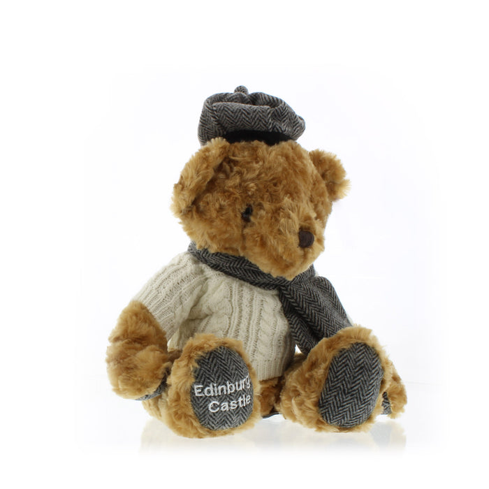 Eddie Teddy Bear wears a aran jumper and a matching tweed hat ans scarf. 