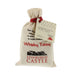 Small hessian bag with a red ribbon and a print of Edinburgh Castle contains all the ingredients for a Whisky Toddy. 