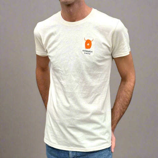 Person wears a beige t-shirt with a motif of a Highland Cow on the left chest 