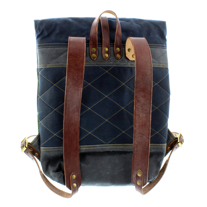 back of fernweh backpack with leather straps and quilted diamond pattern rear face