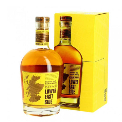 Lower East Side whisky bottle with yellow label and box.  - Image