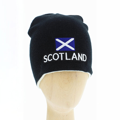 black beanie hat with St Andrews flag and Scotland printed. The reversible hat has white on the other side. 