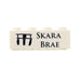 Beige brick with 'Skara Brae' text and black icon on a white background - Image