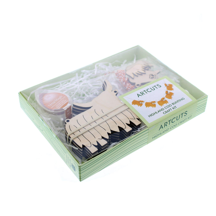 Shallow green box contains products to create a Highland cow Bunting. 