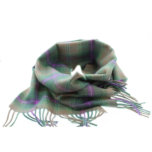 A green and purple woolen tartan scarf is wrapped, mimicking the way it would sit around a neck. 