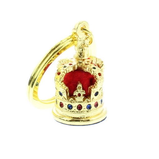 Gold coloured hardware keyring with a red velvet and jeweled crown. 