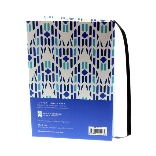 Hard back note book featuring a blue all over print that has been inspired by the windows at Dunfermline Abbey. 