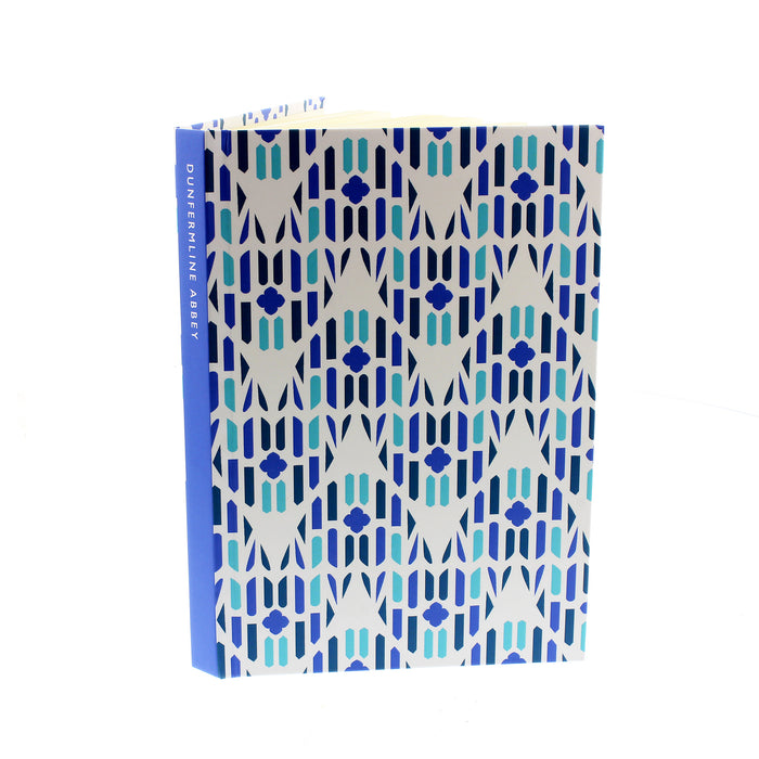 Hard back note book featuring a blue all over print that has been inspired by the windows at Dunfermline Abbey. 