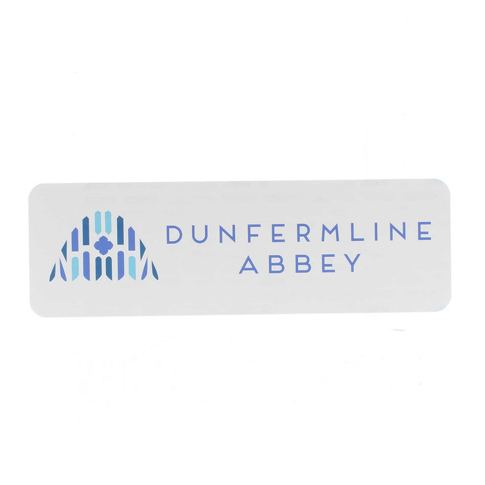 White rectangular heavy paper bookmark with a blue print print to the left inspired by Dunfermline Abbey Windows. The text reads Dunfermline Abbey in blue. 