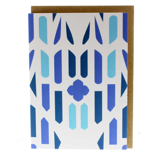 White greeting card with a blue print and brown envelope.