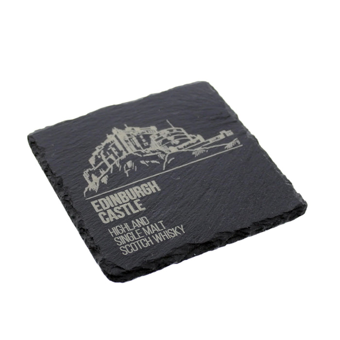 A black slate coaster featuring Edinburgh Castle design and adorned with the phrase 'Highland And Single Malt Scotch Whisky'.