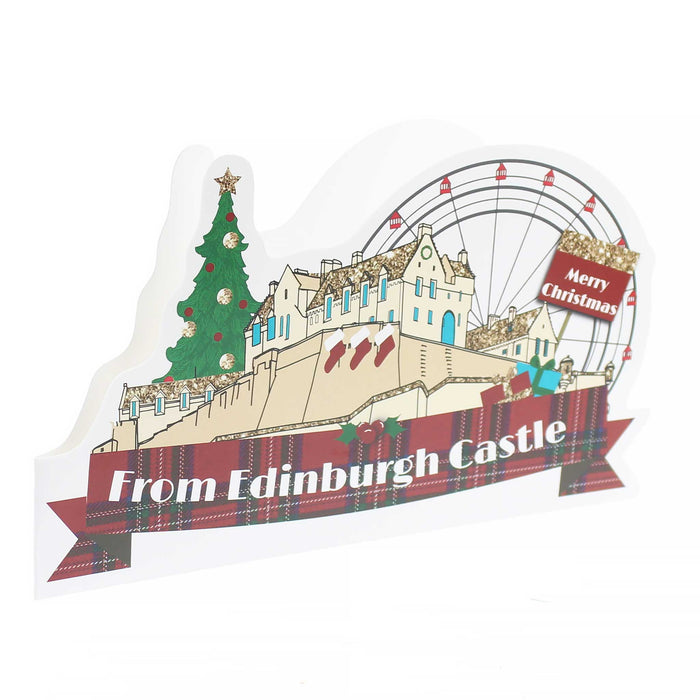 White Christmas Card featuring Edinburgh Castle surrounded by Christmas Trees and a Big Wheel. 