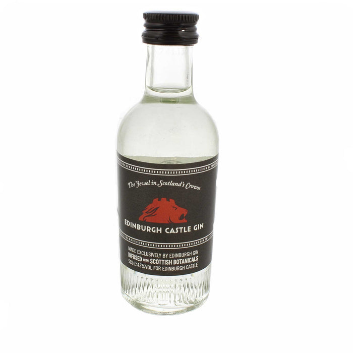 Clear bottle containing the official Edinburgh Castle Gin. The black label on the bottle is printed with a sketch of the castle with the official red lion head logo on top. 