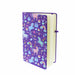 Purple hardback notebook featuring a whimsical scene of castles, unicorns and rainbows. 