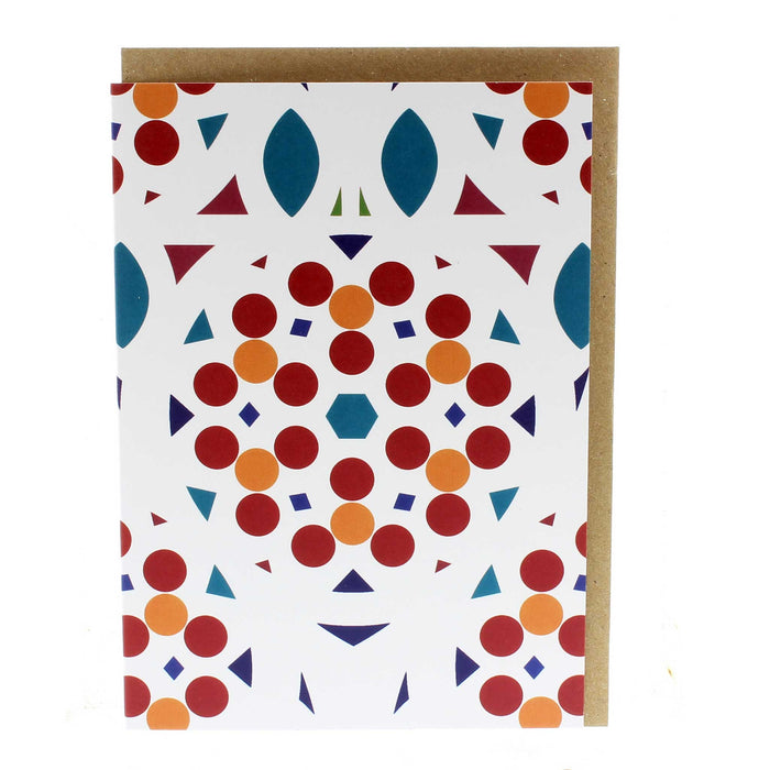 White greeting card with a bold red, orange and blue print. 