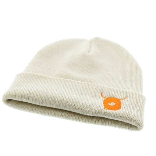 beige beanie featuring a small embroidered highland cow in orange.