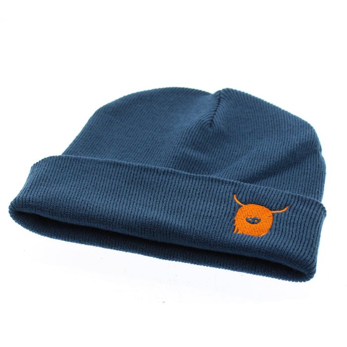 navy beanie featuring a small embroidered highland cow's head in orange. 