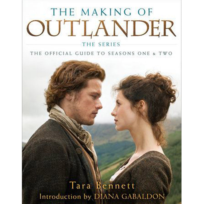 Front cover of the book title 'The Making of Outlander' for seasons 1&2 shows the main characters looking at each other with a mountain landscape in the background. 