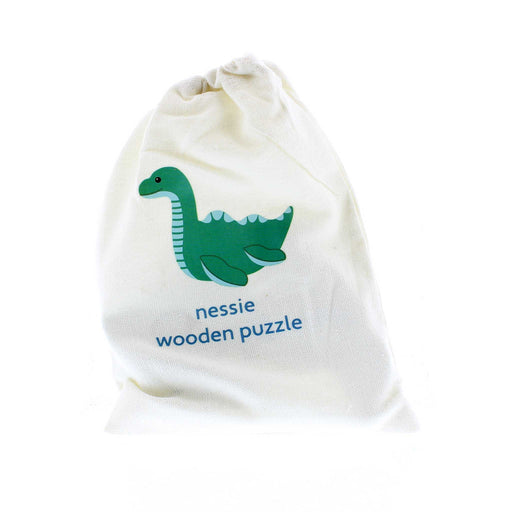 White cotton pouch bag for carrying the nessie wooden toy which is printed on the front of the bag.  