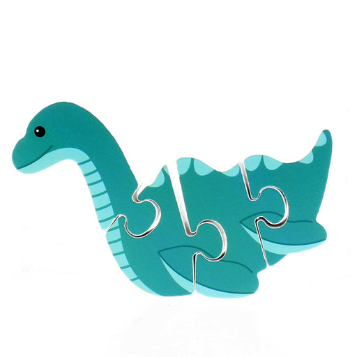 Green Wooden Puzzle toy in the shape of the Loch Ness Monster. 