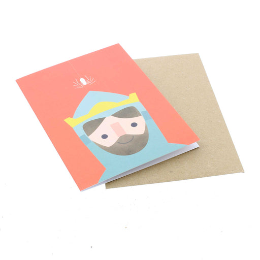 The red Robert the Bruce card is laid flat with it's brown paper envelope. 