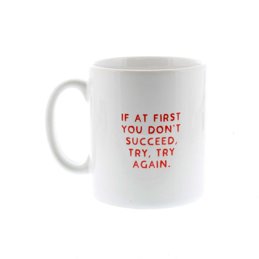 The back of the white mug reads 'If at first you don't succeed, try, try again in red. 