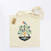 Tote bag featuring symbols of Glasgow's patron Saint Mungo. The bag features a bright print of a tree on top of a fish with a Robin sitting at the top. 