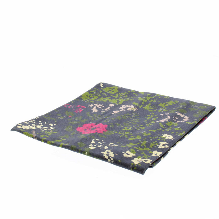 Tapestry print inspired tea towel featuring pinks, greens and cream son a dark blue base. 