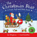 Front cover of The Christmas Bear lift the flap book features a snowy scene with Santa and his helpers on a sleigh. 