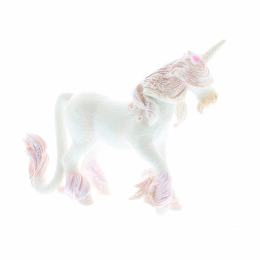 White toy Unicorn figure features pink hair and flashes of glitter. 