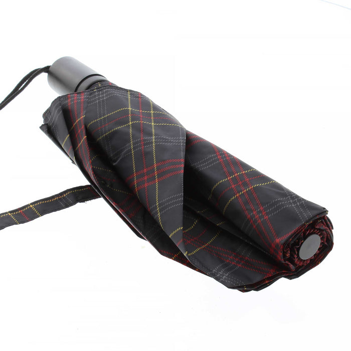 The official Edinburgh Castle Tartan on an extendable umbrella. The tartan features a black base with red, grey and yellow stripes. The folded down umbrella has a self coloured tie and plastic handle.