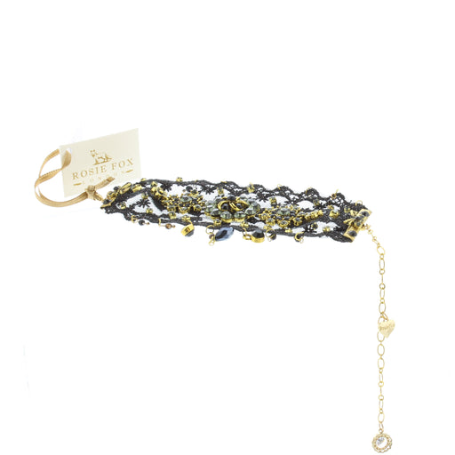 Black Lace cuff with gold and black beading.