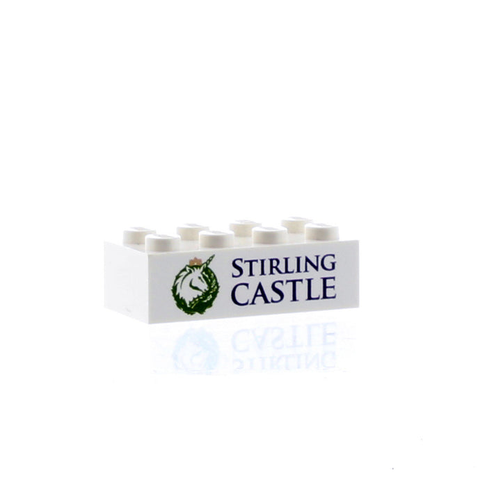 Small white 8-bit brick that can be used with Lego featuring the Stirling Castle Unicorn logo and the text reads Stirling Castle