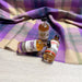 3 Minature bottles of Whisky from Edinburgh Castle, Stirling Castle and Urquhart Castle laid on the Corrie Tartan Throw