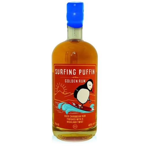 Bottle of Surfing Puffin Golden Rum with a colorful label on a white background - Image
