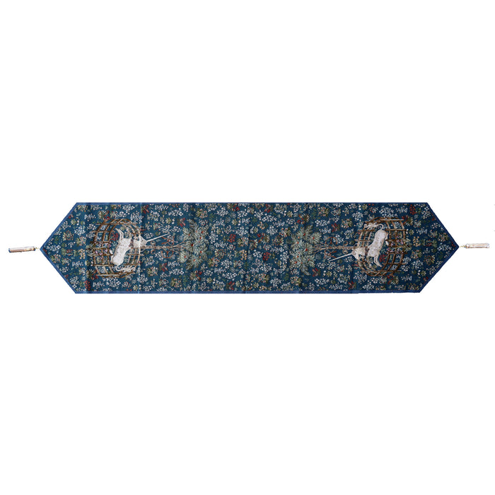 captive unicorn tapestry table runner large with classic unicorn design and tassels to either end in blue green tones