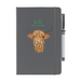 Grey soft feel note pad with a highland cow motif. the text above reads 'hello SCOTLAND' and comes with a silver pen attached.