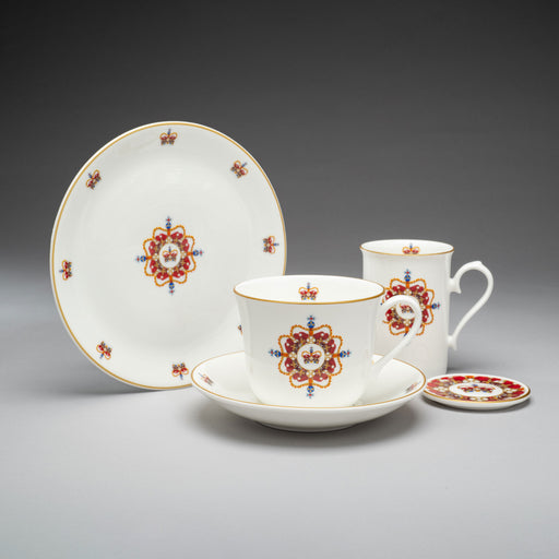 Edinburgh castle crown fine bone china tea cup shown with other items available in the collection including mug, side plate and coaster