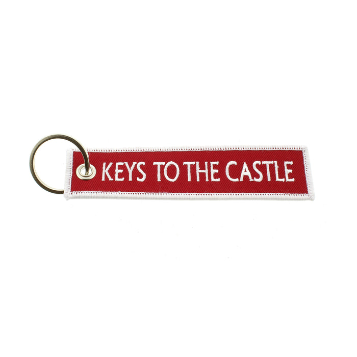Red fabric keyring with the words 'Keys to the Castle' embossed on the front and back