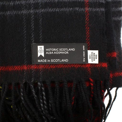 close up detail of the tartan and label on the Edinburgh Castle Wool Throw
