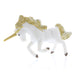 white unicorn toy galloping with gold mane and tail