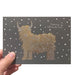 gold foil highland cow illustrated card with round dot snowflakes in background and the words merry christmas - Image