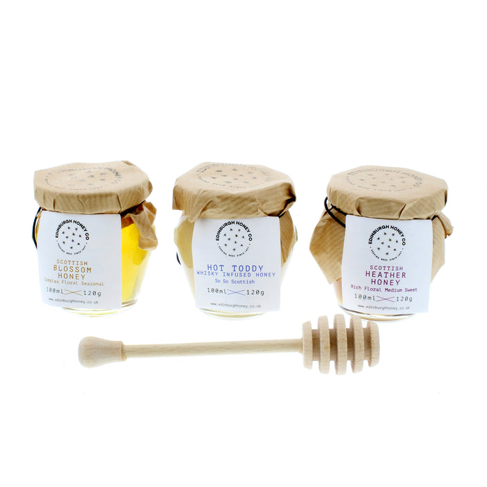edinburgh scottish honey set of 3 jars shown with wooden honey drizzler in front of jars on white background