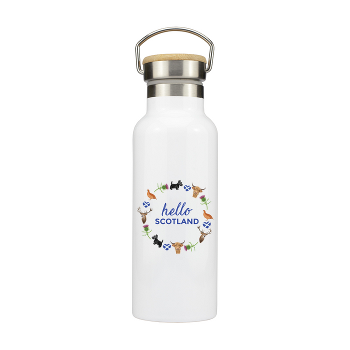 White stainless steel water bottle with a silver and bamboo cap closure. The motif on the front features the words 'Hello Scotland' surrounded by a circular design with Scottish animals and flowers. 